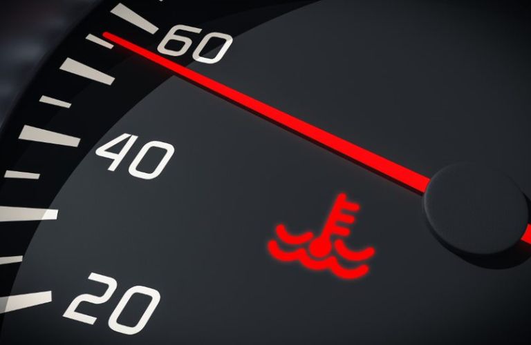 Heated engine warning sign on a digital gauge