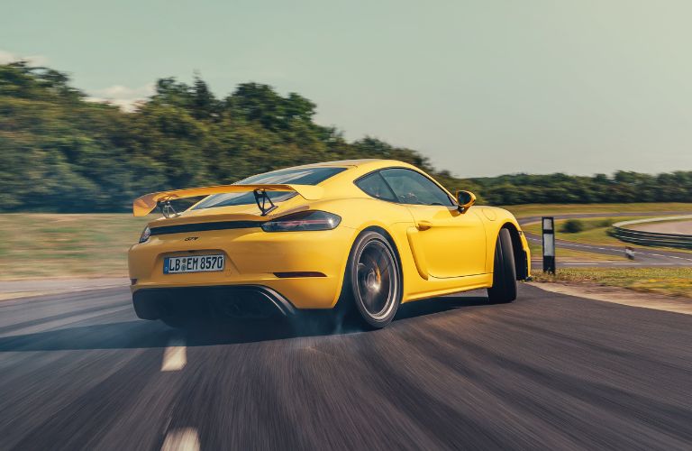 yellow 2020 Porsche 718 Cayman