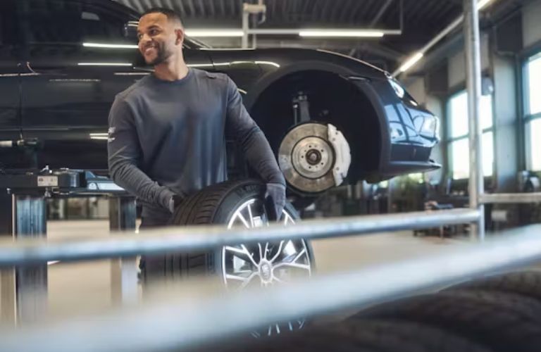 A mechanic working on a vehicle