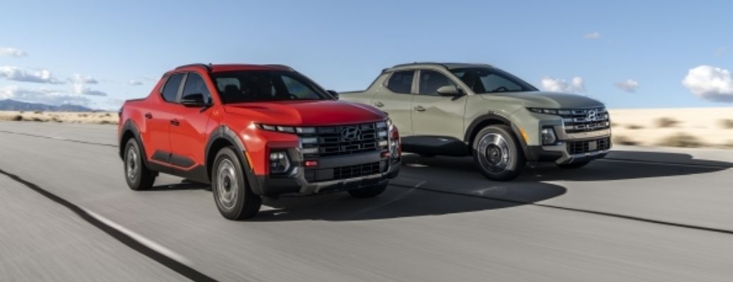 Two 2025 Hyundai Santa Cruz side by side
