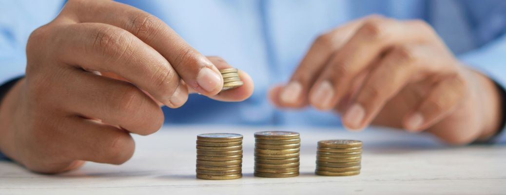 Man Counting coins