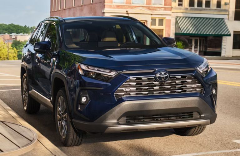 2025 Toyota RAV4 side and front view