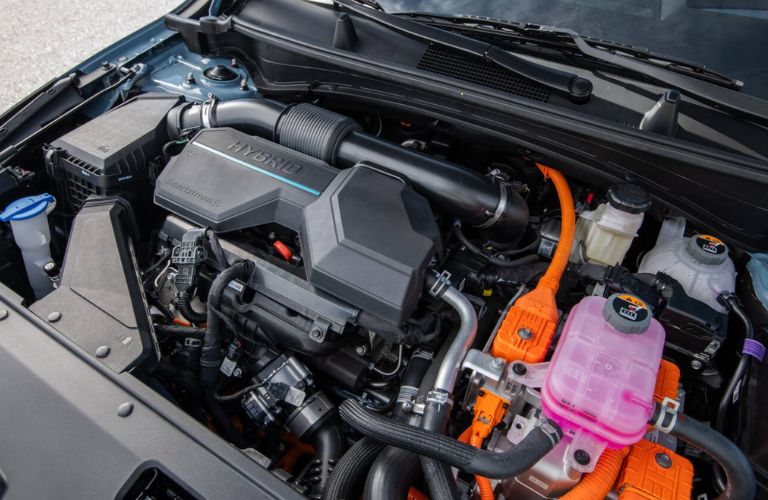 under the hood image of a 2026 Kia Sportage Hybrid