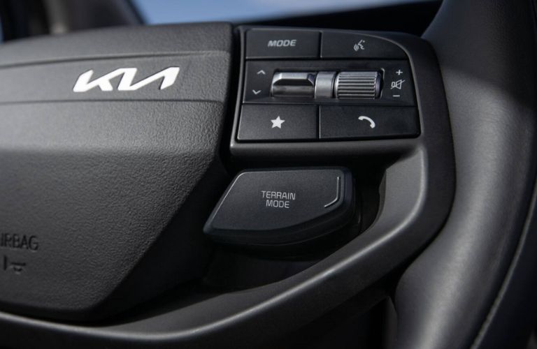 steering mounted controls of the 2026 Kia Sportage Hybrid