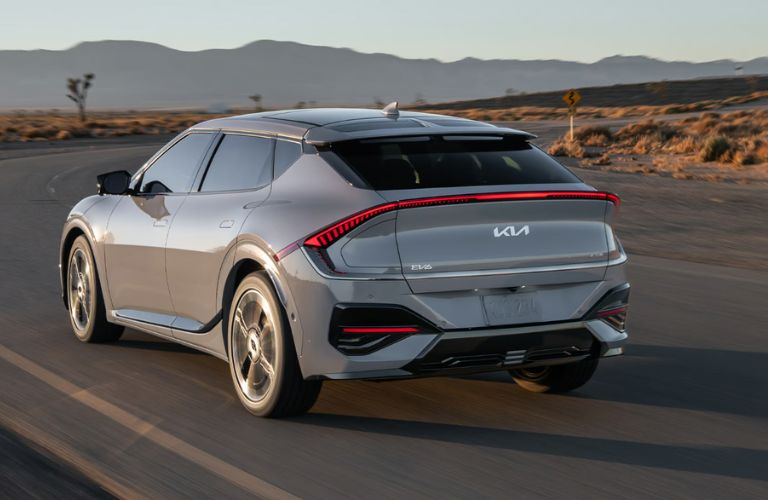 rear view of the 2025 Kia EV6 driving away on the road