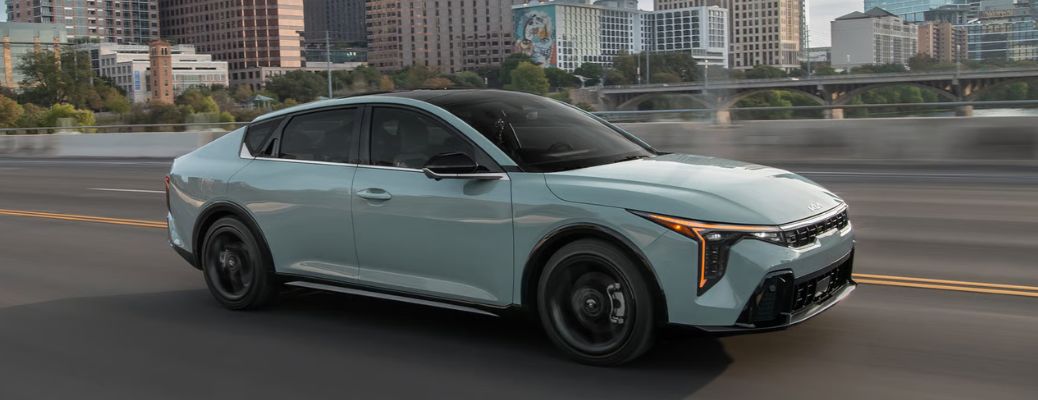 2026 Kia K4 side and partial front view