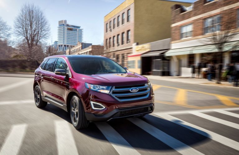 2017 Ford Edge Red driving on the road