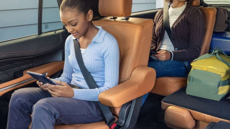Passengers enjoying WiFi courtesy of the Ford Connectivity Package
