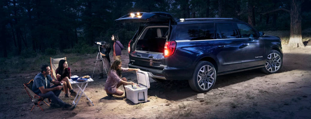 A family enjoying the 2025 Ford Expedition at a campsite
