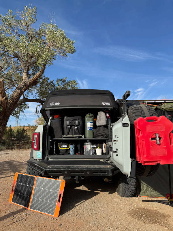 A rear exterior view of the Ford Bronco Badlands Sasquatch loaded with camping gear