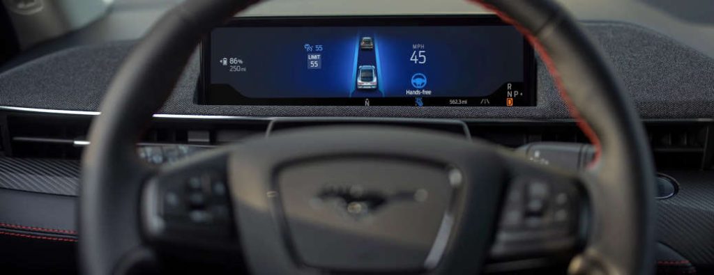 A Ford vehicle with BlueCruise hands-free driving mode engaged.