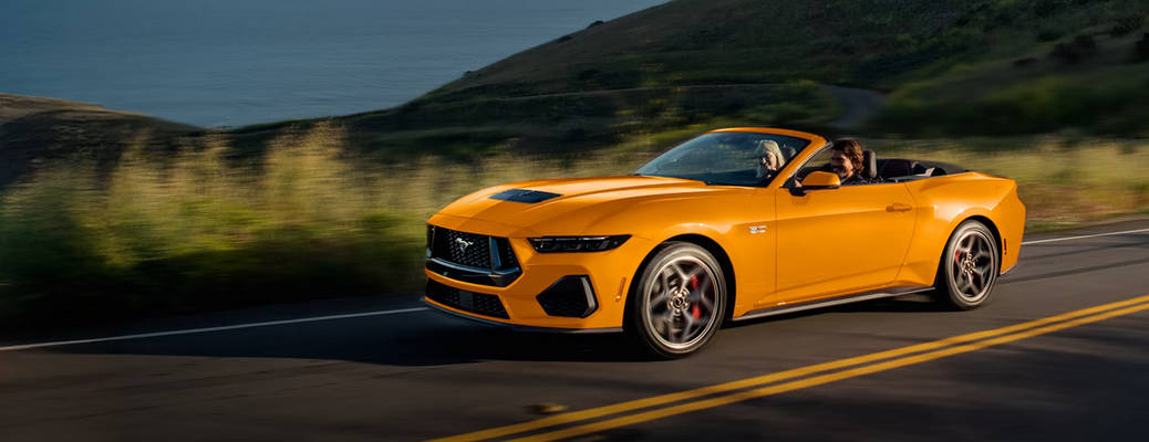 The 2026 Ford Mustang GT 5.0 convertible on the open road.