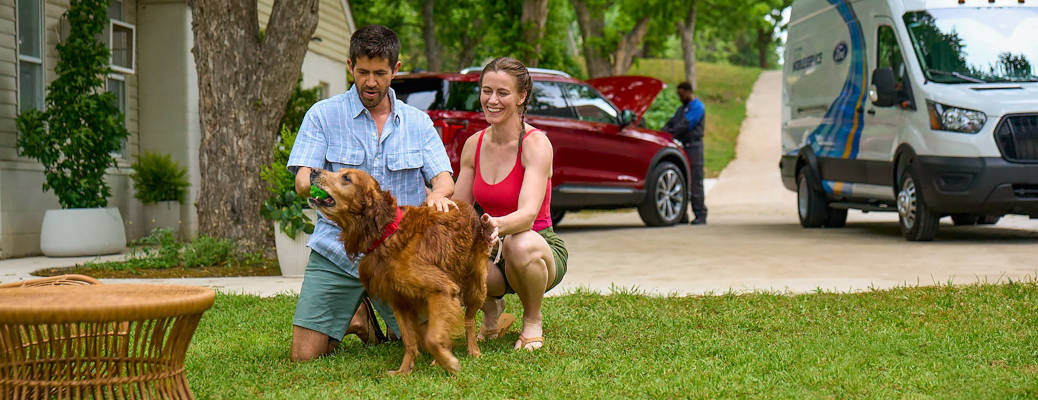 A couple enjoying the freedom provided by having their Ford serviced at home