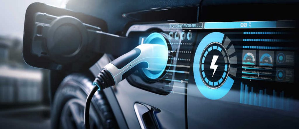 A concept image of a plug-in hybrid at a charging station - an eco-friendly way of driving.