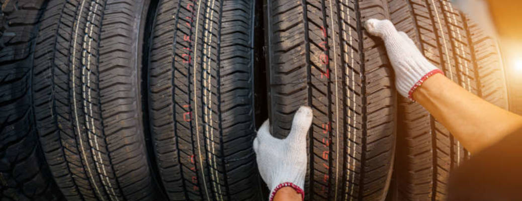 A tire care technician at Akins Ford in Winder, GA