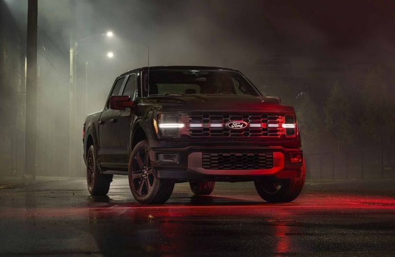 2026 Ford F-150 parked at night in mist