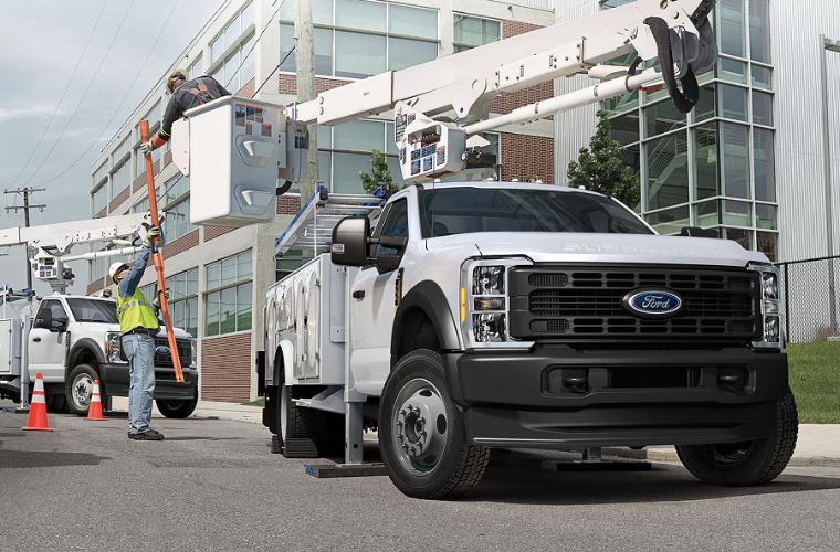 a Ford F-Series commercial truck on a work site