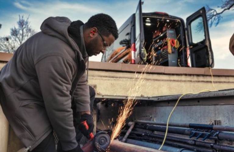 a man using Pro Power Onboard to power his tools