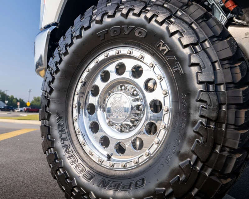 A view of the custom wheel and Toyo tires on the 2026 Ford F-250 tu-tone retro mod from Wild Willies