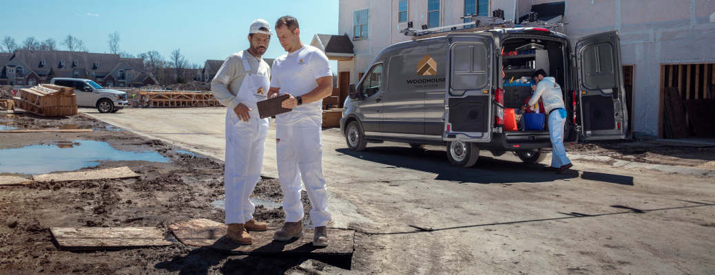 A crew at a job site using a vehicle found in the Ford Pro Advantage program