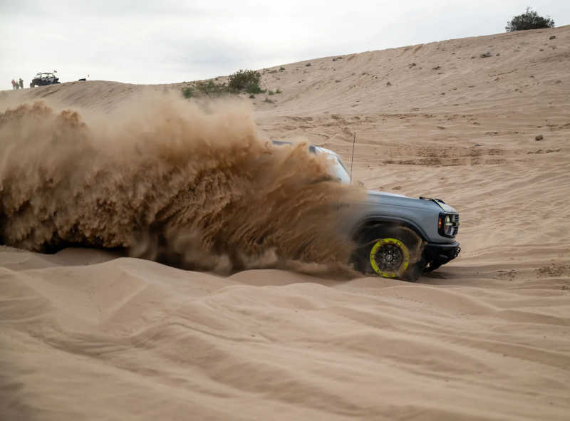 The 2027 Ford Bronco showing off its off-roading performance on sand dunes