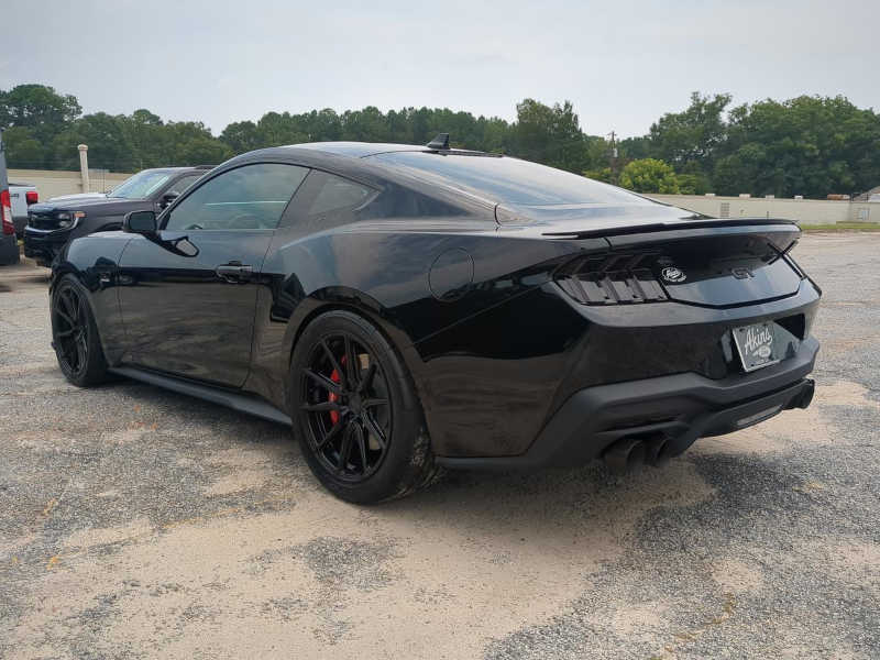 A rear exterior 3/4 view of the 2026 Ford Mustang GT 5.0 created by Wild Willies