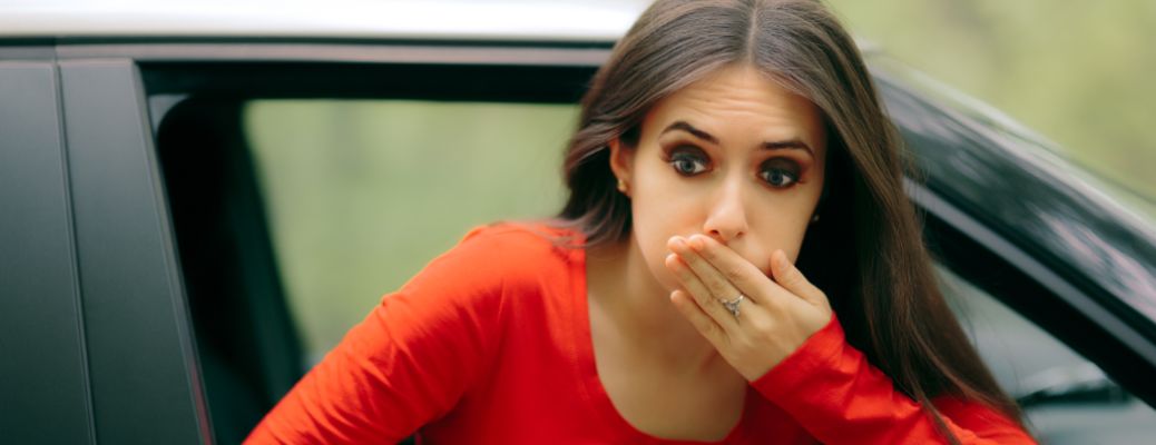 representative image of a woman vomiting