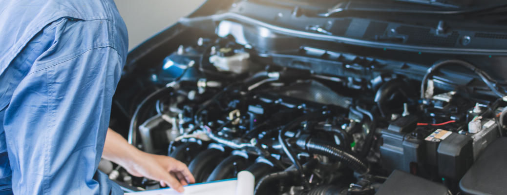 a technician prepping a car for winter