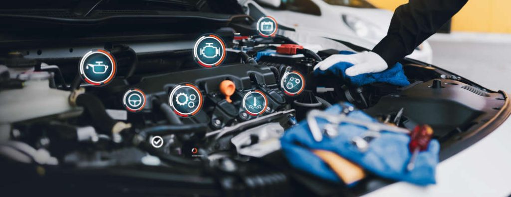 Professional car mechanic checklist for working on the engine of the car in the garage for car auto repair service and maintenance check concept for the car before leaving.