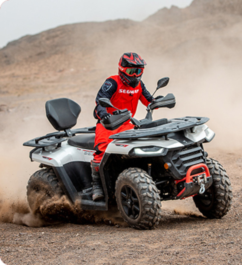 A Segway ATV from YEG Powersports off-roading in the dirt
