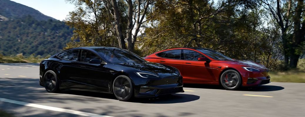 Two Tesla Model S vehicles on the road