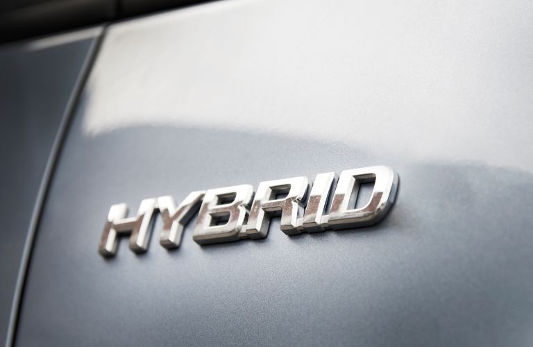 close up of "Hybrid" on a Kia