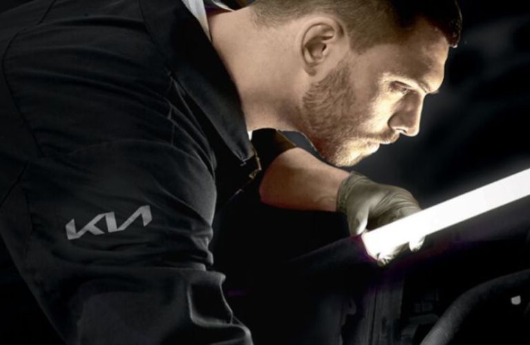 close up of a Kia technician