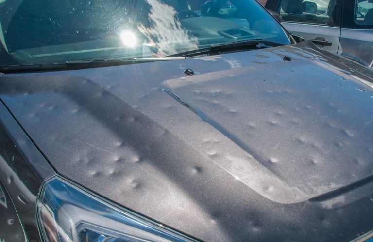 Vehicle's hood damaged by hail