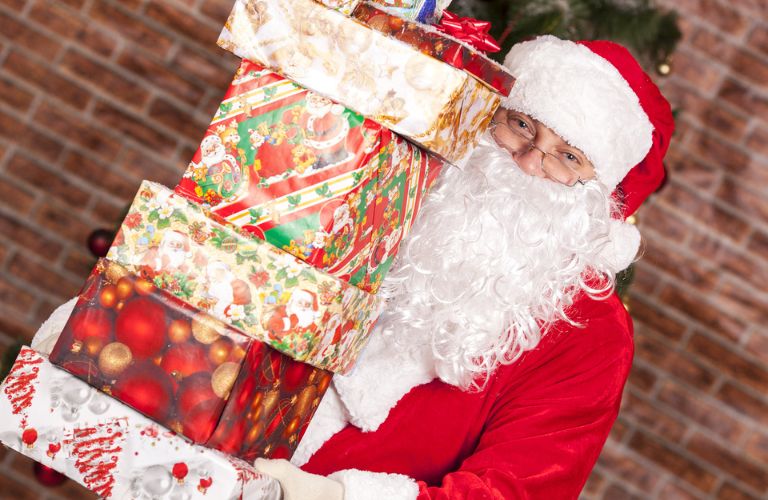Santa holding gifts