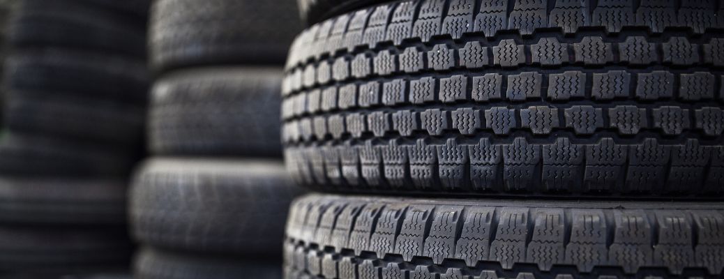 stacked tires in separate piles