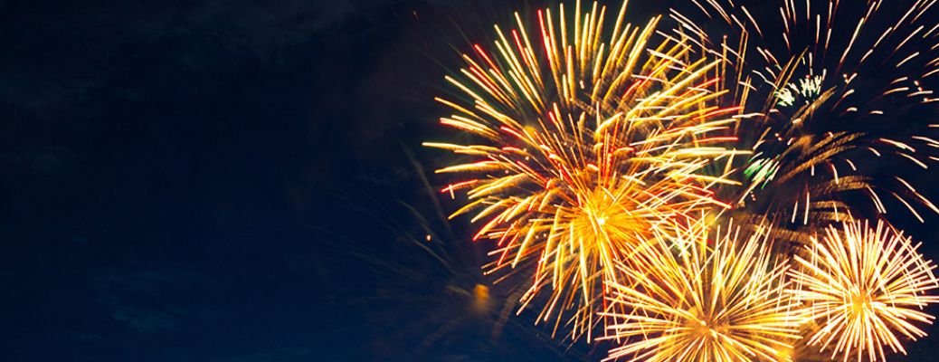 a black night sky with fireworks