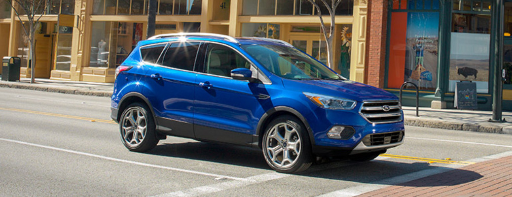 2017 Ford Escape side view in a city