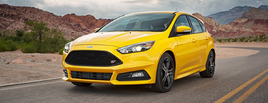 2017 Ford Focus in yellow on a road