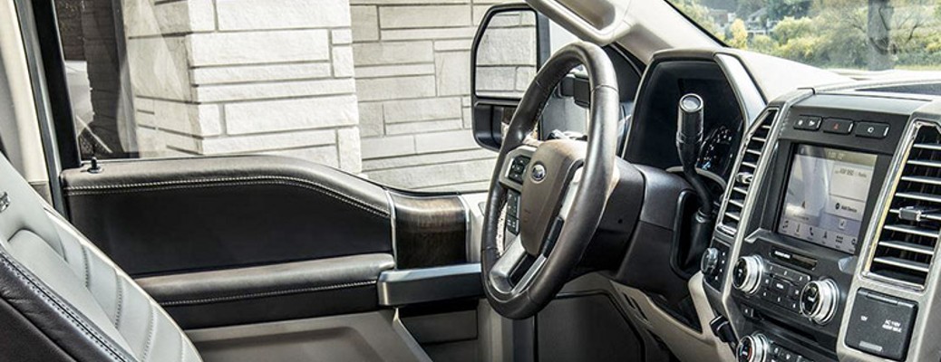 2018 Ford F-150 Lariat front seats side view