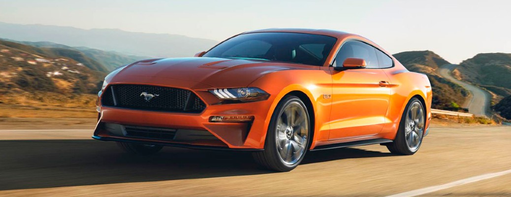 2018 Ford Mustang front and side angle with orange paint