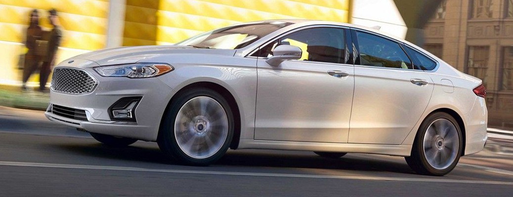 2019 Ford Fusion side view in a city