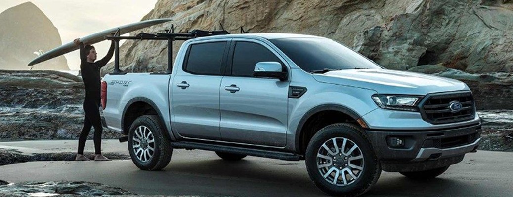 2019 Ford Ranger side view with a surfer