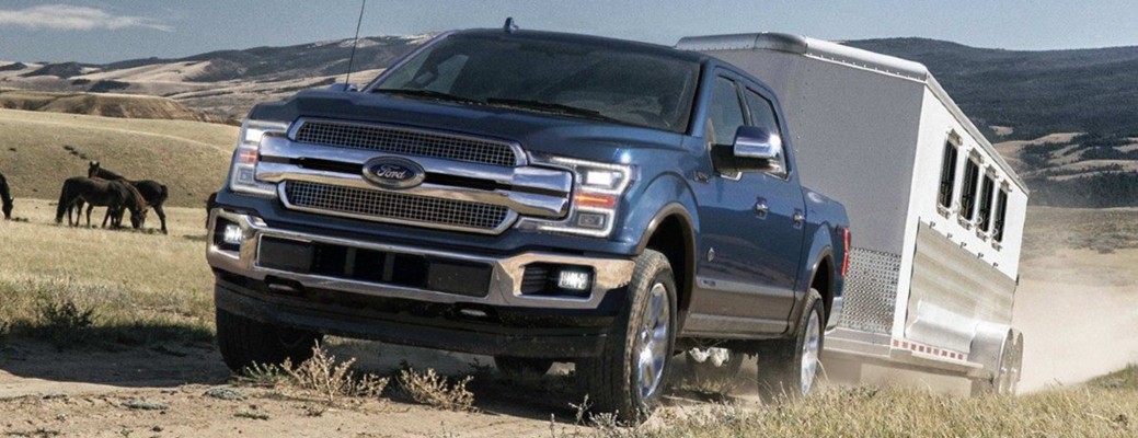 2019 Ford F-150 truck towing a trailer