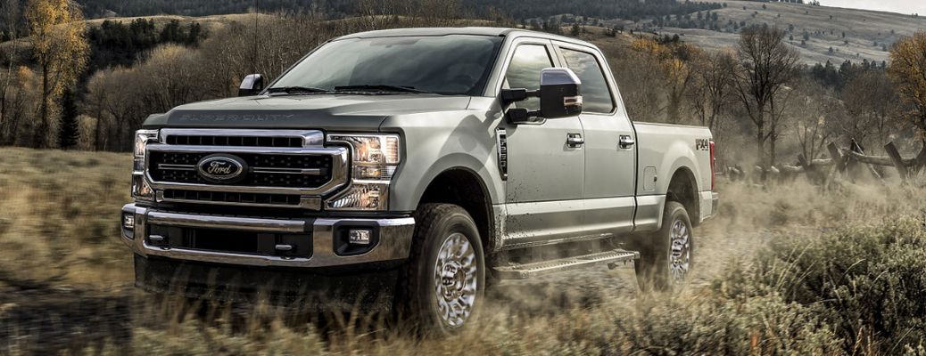 2020 Ford Super Duty parked in a field of grass