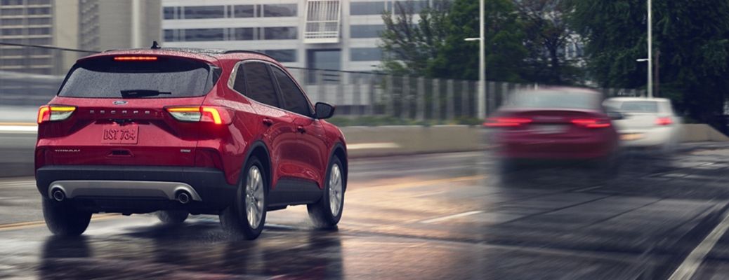 2020 Ford Escape rear view driving in a city