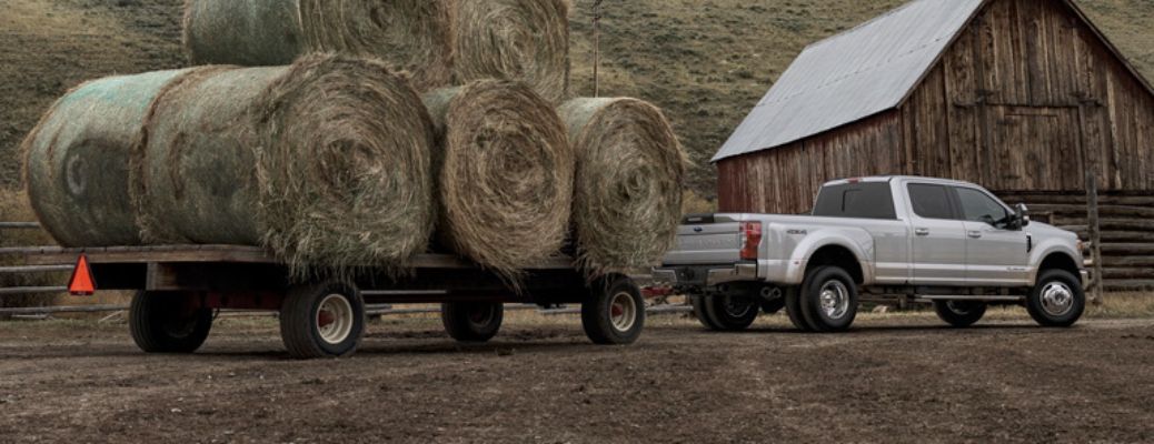 2020 Ford Super Duty truck towing hay