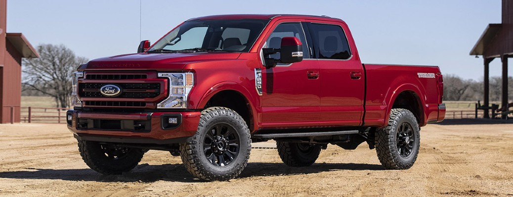 2022 Ford F-250 Lariat side view with red paint