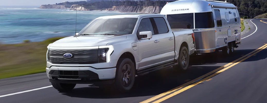 2022 Ford Lightning Lariat towing a trailer