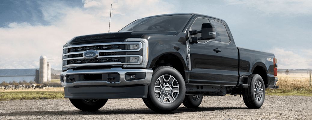 2023 Ford Super Duty front view by a white barn